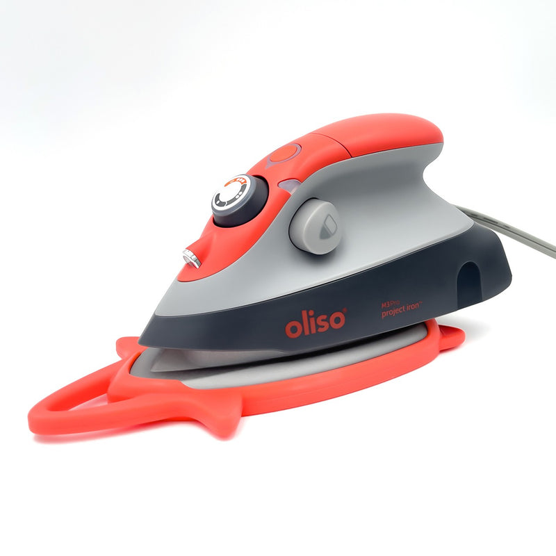 Oliso-mini-iron-with-trivet-coral